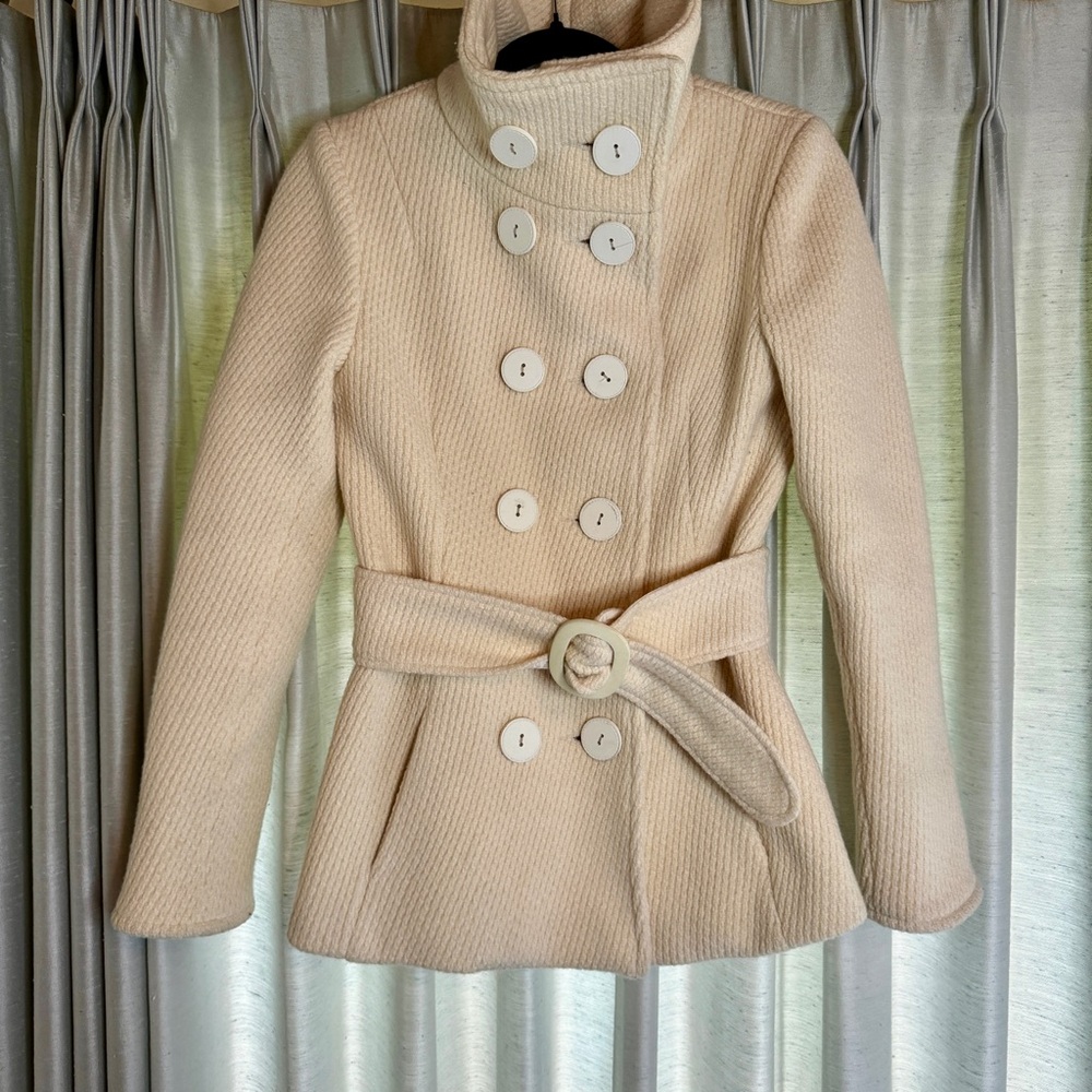 Double breasted pea coat can be worn with or without belt. Fits smaller- 2-4